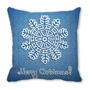 Detail of Christmas pillowcase with blue snowflake pattern and Merry Christmas text
