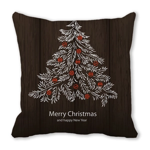 Detail of Christmas pillowcase with brown wood grain texture and printed tree pattern