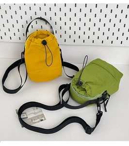 Lightweight nylon crossbody water bottle bags in lemon yellow and green colors