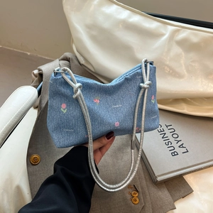 Denim tote bag with tulip embroidery, Creative Cat logo, and rope shoulder straps