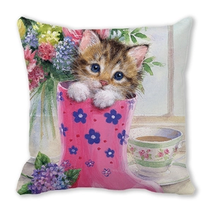 Detail of a square pillowcase featuring a cute brown tabby cat illustration in a floral boot