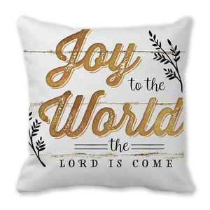 Detail of soft peach skin cushion cover with vintage Joy to the World holiday print