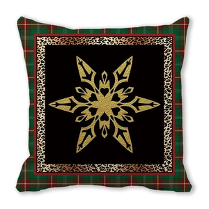 Detail of Christmas pillowcase featuring red green plaid, leopard print, and gold star