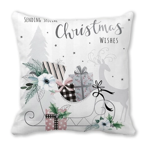 White Christmas pillow cover with festive reindeer sled illustration and holiday wishes