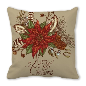 Detail of Christmas pillow cover featuring red poinsettia and Merry Christmas text