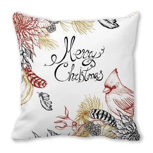 Macro detail of Merry Christmas print on peach skin pillowcase with cardinal and pine cones