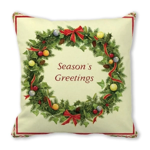 Detail of Christmas pillowcase with festive wreath and Season's Greetings text print