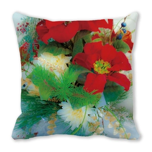 Detail view of peach skin fabric pillowcase featuring red poinsettia and pine needles