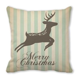 Close-up of Merry Christmas pillowcase featuring a brown reindeer on green stripes