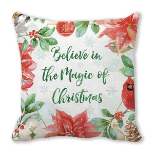Detail of Christmas pillow cover with watercolor florals and Believe in Magic text