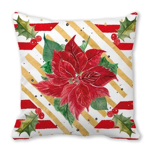 Close-up of floral pillowcase with poinsettia, holly leaves and festive stripes