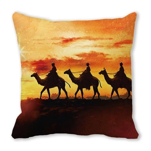 Exotic silhouette of camel riders in a desert sunset printed on a square pillow cover