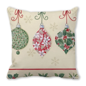 Close-up of peach skin pillowcase featuring festive Christmas ornaments and holly leaves