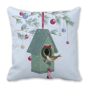 Detail of Christmas birdhouse and winter wreath print on a peach skin pillow cover