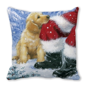 Nahaufnahme eines Kissenbezugs mit Golden Retriever Welpen und Weihnachts-Illustration