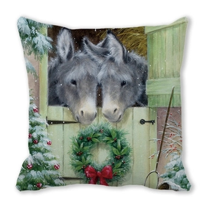 Detailansicht der Kissenhülle aus Pfirsichhaut-Stoff mit künstlerischem Esel-Weihnachtsdruck