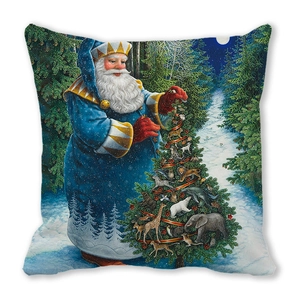 Détail d'une taie de coussin de Noël avec le Père Noël et des animaux sur tissu peau de pêche