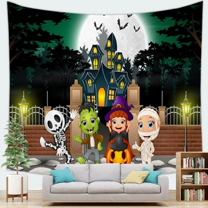 Detail of Halloween tapestry with moon, bats and cartoon characters over a sofa