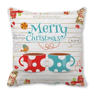 Detail of Christmas pillowcase featuring festive mugs, bear and Merry Christmas print