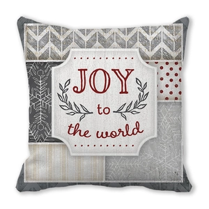 Detail of Santa cushion cover featuring patchwork patterns and Joy to the World text
