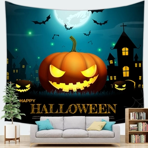 Detailed view of Halloween pumpkin tapestry hanging over a modern sofa in a living room