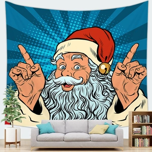 Pop art Santa Claus Christmas tapestry on wall above a cozy living room sofa setup