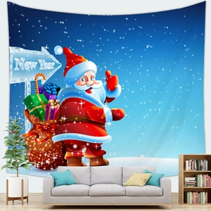 Detailed view of a Santa Claus wall tapestry hanging above a modern living room sofa