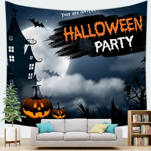 Detailed view of Halloween tapestry featuring haunted castle and moon above a sofa