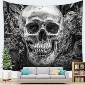 Gothic skull wall tapestry in black and white realistic style above a beige sofa