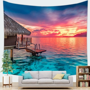Tropical sunset beach tapestry featuring water villas and vibrant mountain landscape