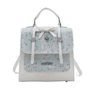 Floral print handbag with white lace trim and bow accent in French retro style