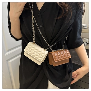 Quilted mini crossbody bags in cream and brown with gold chain straps shown on models