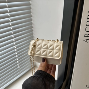 Miniature cream quilted leather crossbody bag with elegant gold chain strap for women