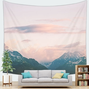 Natural landscape tapestry featuring majestic snow mountains over a cozy living room sofa