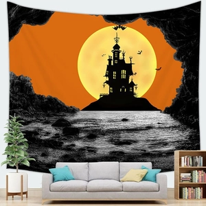 Halloween tapestry with yellow moon and castle silhouette hanging over a modern sofa