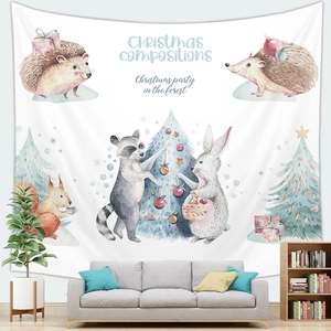 Christmas forest animals tapestry wall hanging decoration over a grey sofa in a living room