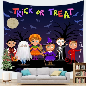 Detail of Halloween tapestry with cartoon kids and Trick or Treat text over a modern sofa