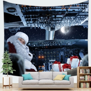 Close-up of Santa Claus in a spaceship tapestry hung above a sofa in a modern room
