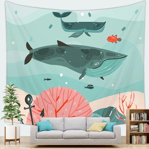 Cartoon whale ocean tapestry wall hanging above sofa in a modern minimalist living room