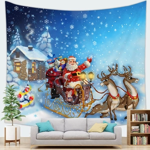 Close-up of Christmas tapestry detail showing Santa Claus and reindeer on a wall