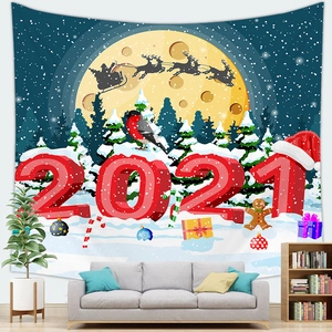 Cozy living room interior showing a Christmas 2021 wall tapestry with Santa and reindeer