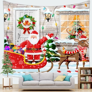 Detail of Christmas wall tapestry featuring Santa Claus in a sleigh above a modern sofa