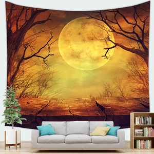 Detailed view of Halloween tapestry with moon and forest hung in a modern living room