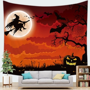 Detailed view of Halloween tapestry with witch silhouette and pumpkin in living room