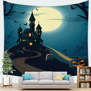 Detail showing a Halloween tapestry with spooky castle and pumpkins on a white wall