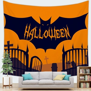 Macro detail of Halloween tapestry with bat silhouettes and spooky cemetery theme
