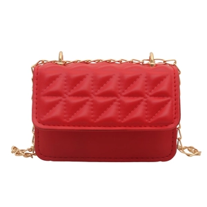 Red quilted square crossbody bag with gold chain strap on white background