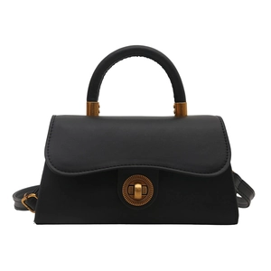 Retro black crossbody bag with vintage gold circular lock and top handle for women