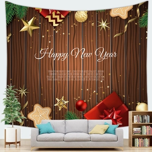 Detail of a Merry Christmas wall tapestry showing festive ornaments on wood background