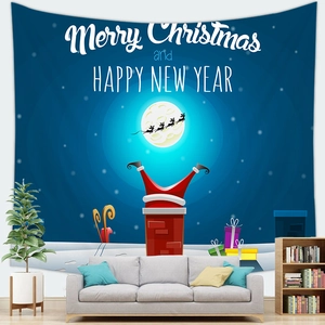 Detailed Christmas wall tapestry featuring Santa and reindeer silhouette in a cozy living room